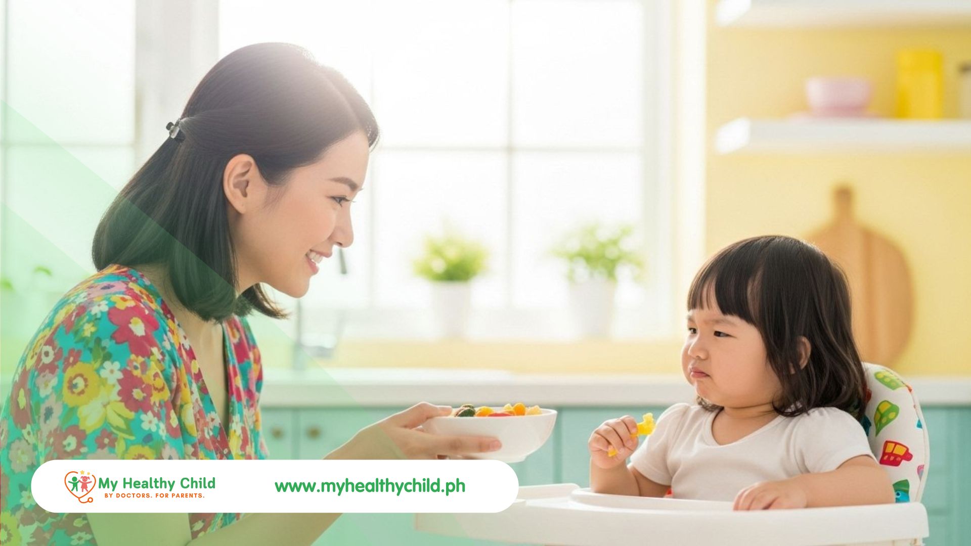 Mom feeding the baby who doesn't like to eat